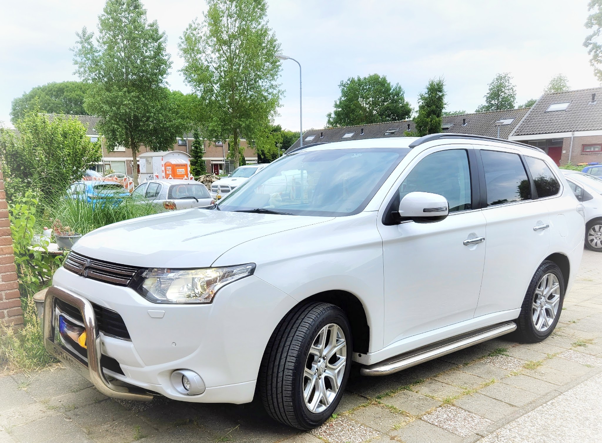 Witte Mitsubishi Outlander, foto van een klant